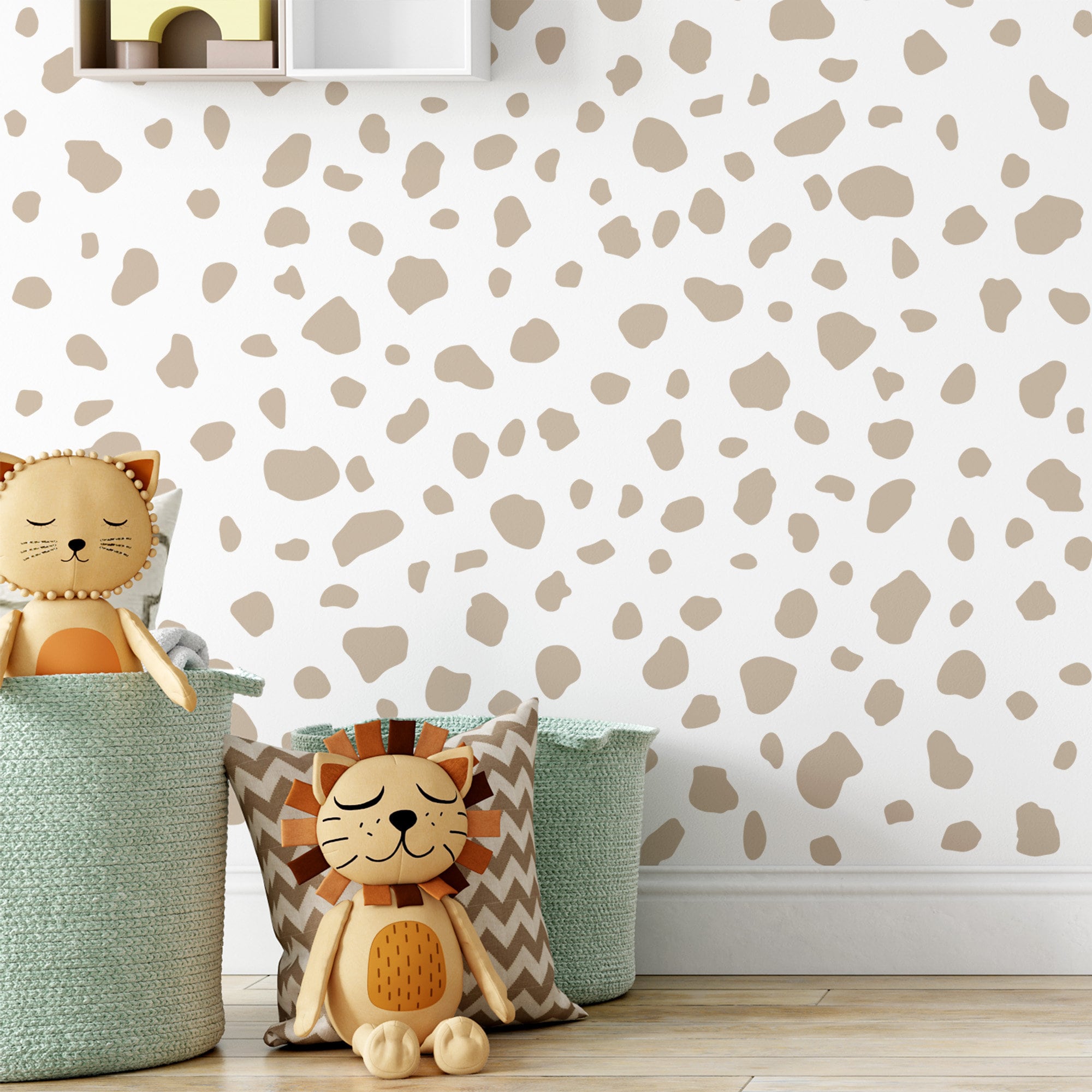 A cozy childrens room displays two stuffed animals, a lion and a cat, inside soft, textured baskets. The wall is decorated with whimsical Dalmatian Spot Stickers from My Store, adding a playful touch to the space.
