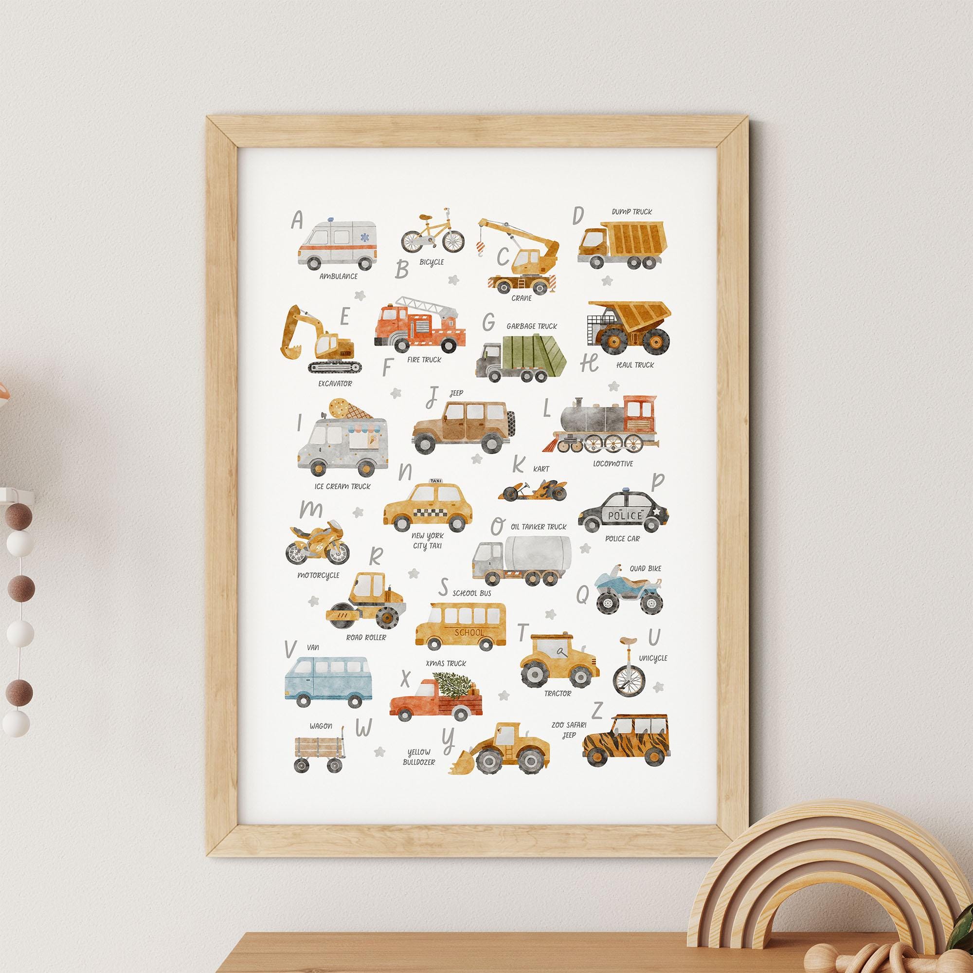 The Transport Alphabet & Numbers Print by My Store is an ideal nursery art piece, featuring a framed poster of vehicles for each letter, from ambulance to zamboni. It elegantly hangs on a light-colored wall, making it a perfect educational tool.